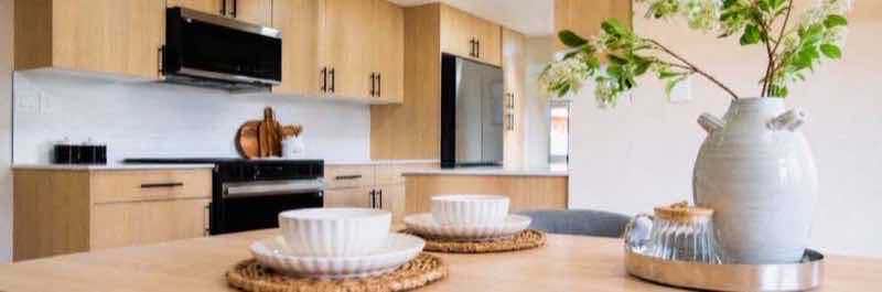 Light wood frameless kitchen with matte cabinetry