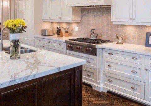 Shaker style kitchen with framed cabinets and large island